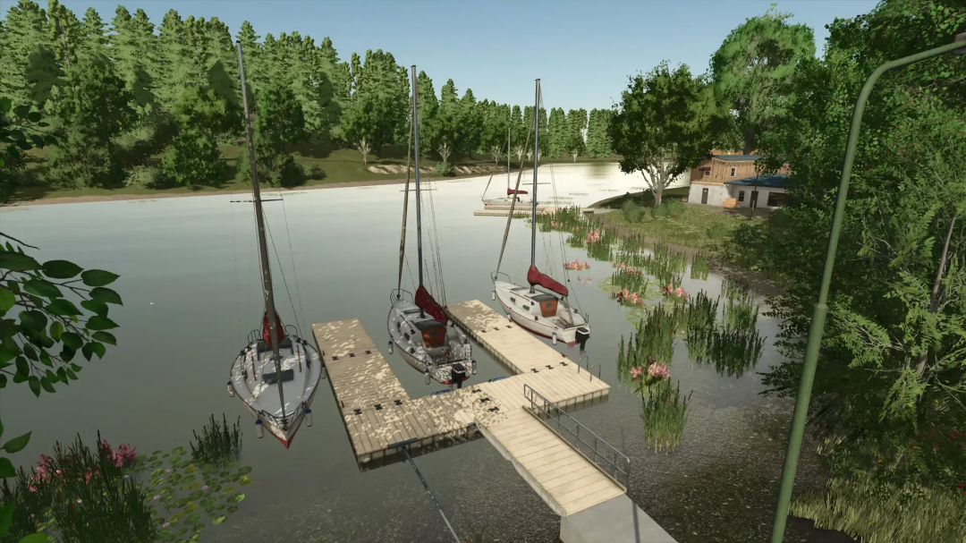Sailboats docked at a wooden pier on a peaceful lake, with trees and a house in the background, for Farming Simulator 25 mods.