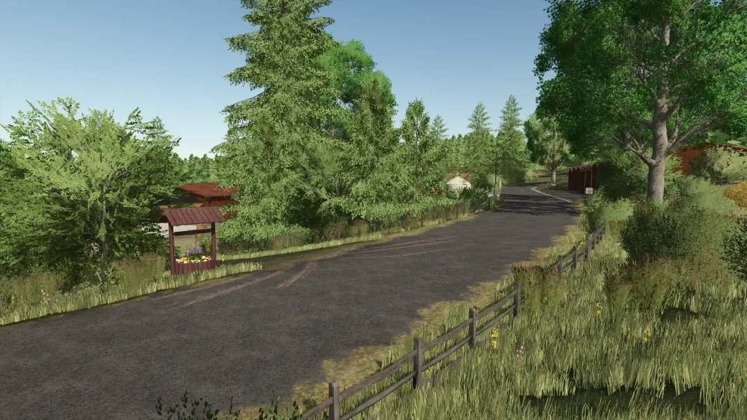 Scenic rural road with lush trees and a flower-laden shelter in Farming Simulator 25 with the FBM25 Sonnental mod v2.0.1.0