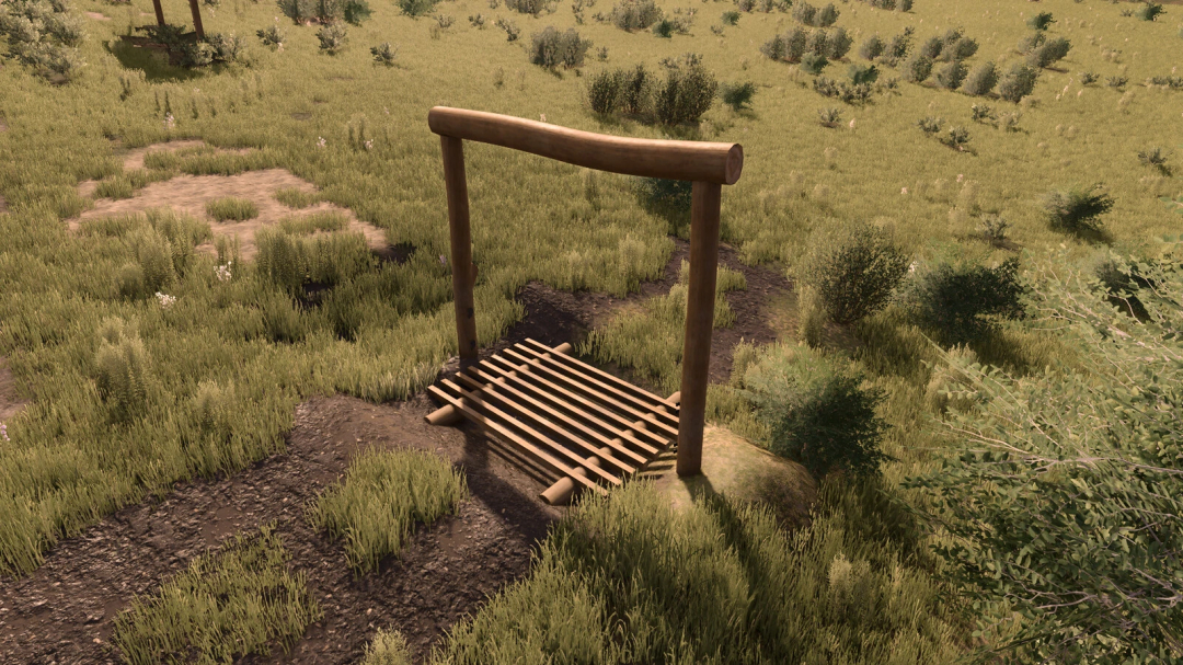 Farm entrance mod in Farming Simulator 25, featuring a wooden gate with a slatted wooden floor and surrounding grassy landscape.