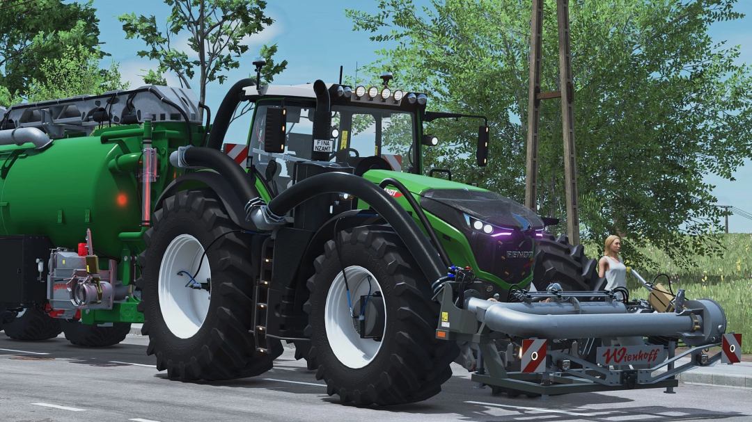 Fendt 1000 Vario tractor mod in Farming Simulator 25, equipped with a large tank and front-mounted equipment, driving on a rural road.