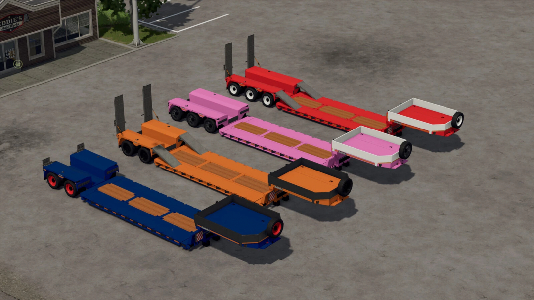 Colorful farming trailers from the Goldhofer STZ-VP Pack v1.0.0.0 mod for Farming Simulator 25, parked on a lot.