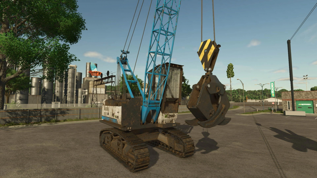 Farming Simulator 25 mod showcasing a blue crane with grapple yarder for logging tasks in FS25.