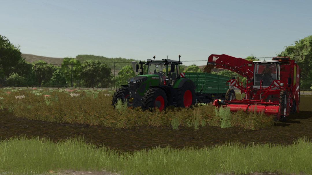 Farming Simulator 25 mod featuring a green tractor and red Terra Trac equipment for plowing fields in FS25 mods.
