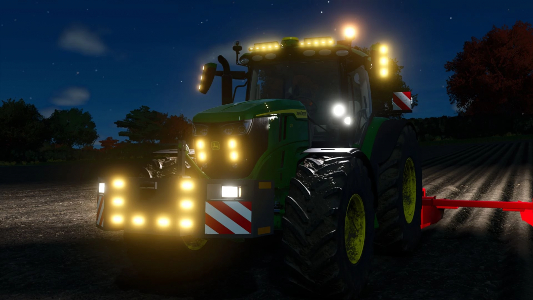 Farming Simulator 25 mod: John Deere 6R Large Frame Series equipped with lights at night on a farm field.