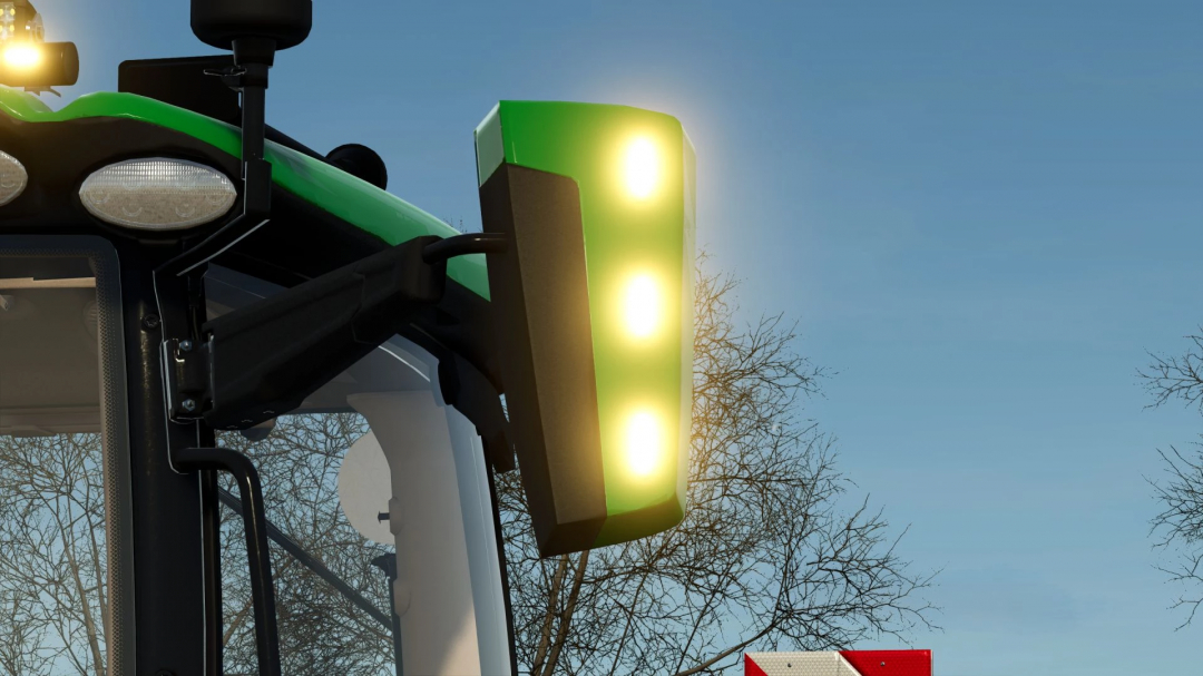 Close-up of the rear green and yellow flashing lights on a John Deere 6R Large Frame Series tractor in Farming Simulator 25 game.