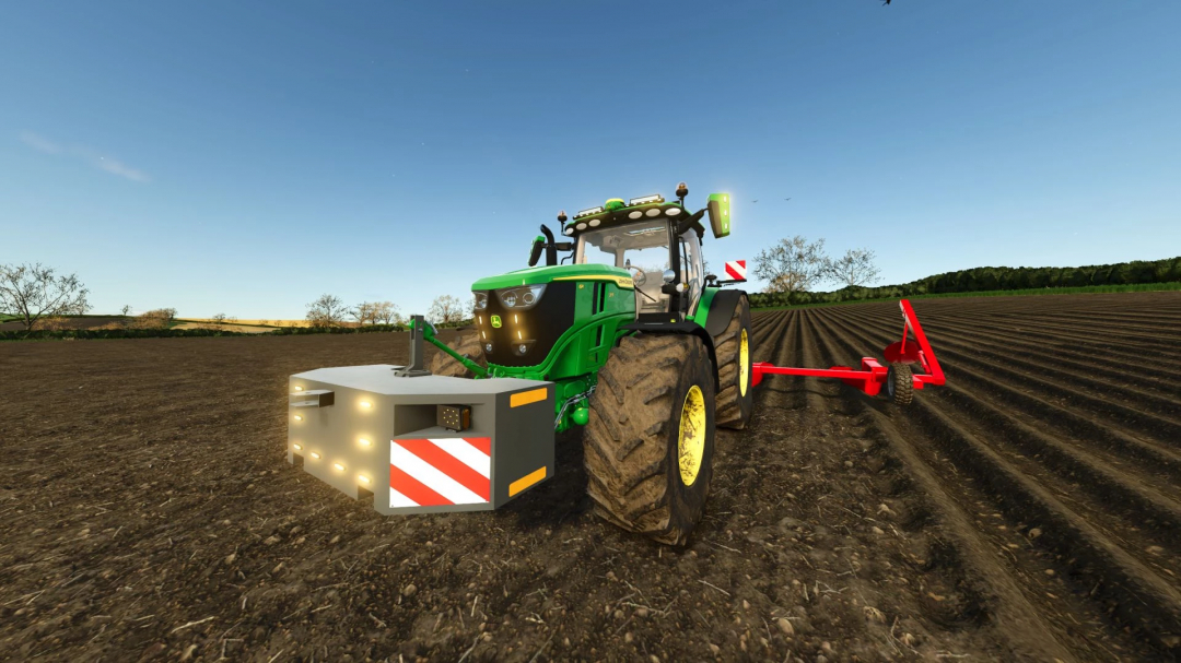 Farming Simulator 25 mod: John Deere 6R Large Frame Series tractor plowing fields with a red cultivator attachment, realistic terrain and sky.