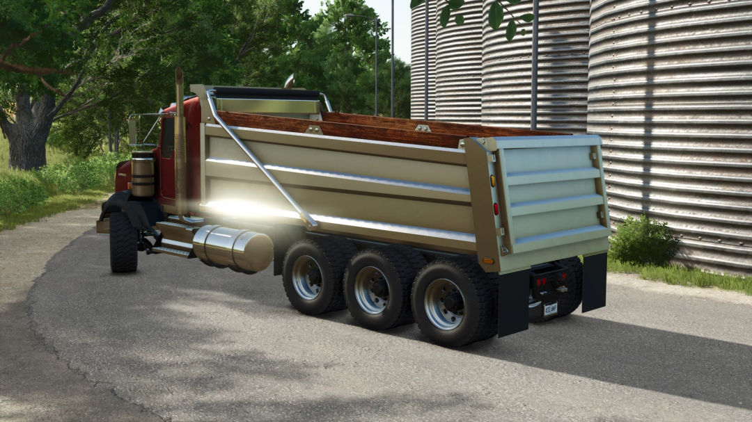 Farming Simulator 25 mod featuring a Kenworth T800 Dumper truck with three axles and a cargo bed, suitable for farming and transport tasks.