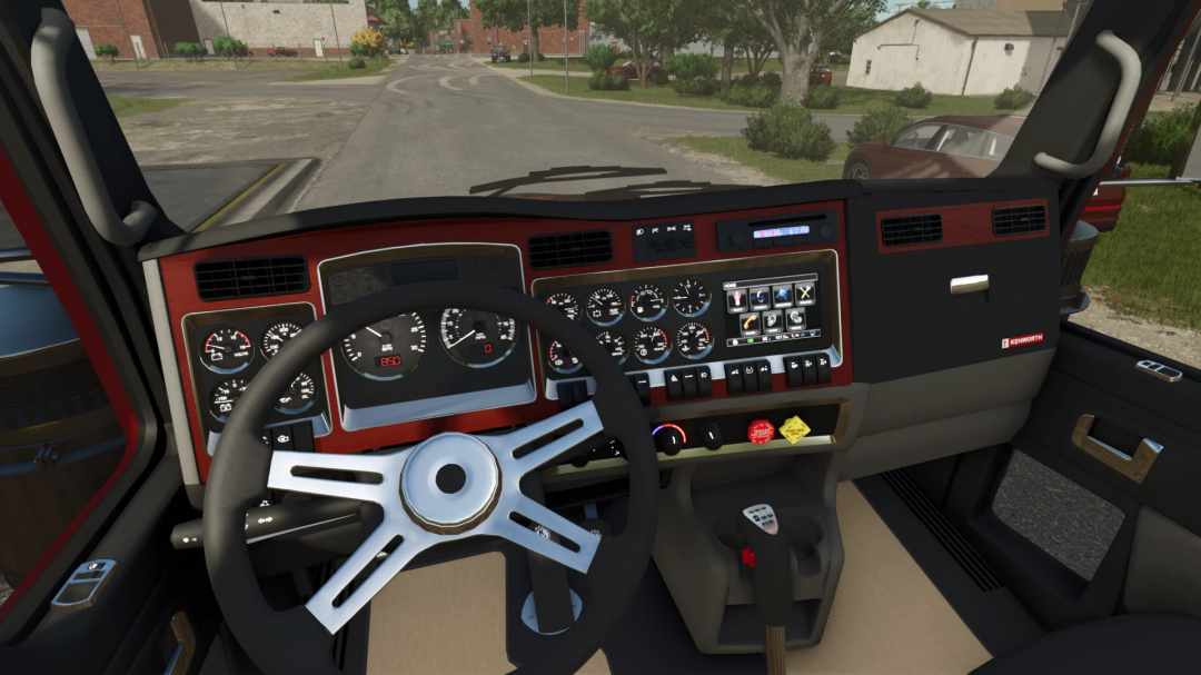 Inside view of a Kenworth T800 Dumper in Farming Simulator 25, showing detailed dashboard and steering wheel mods.