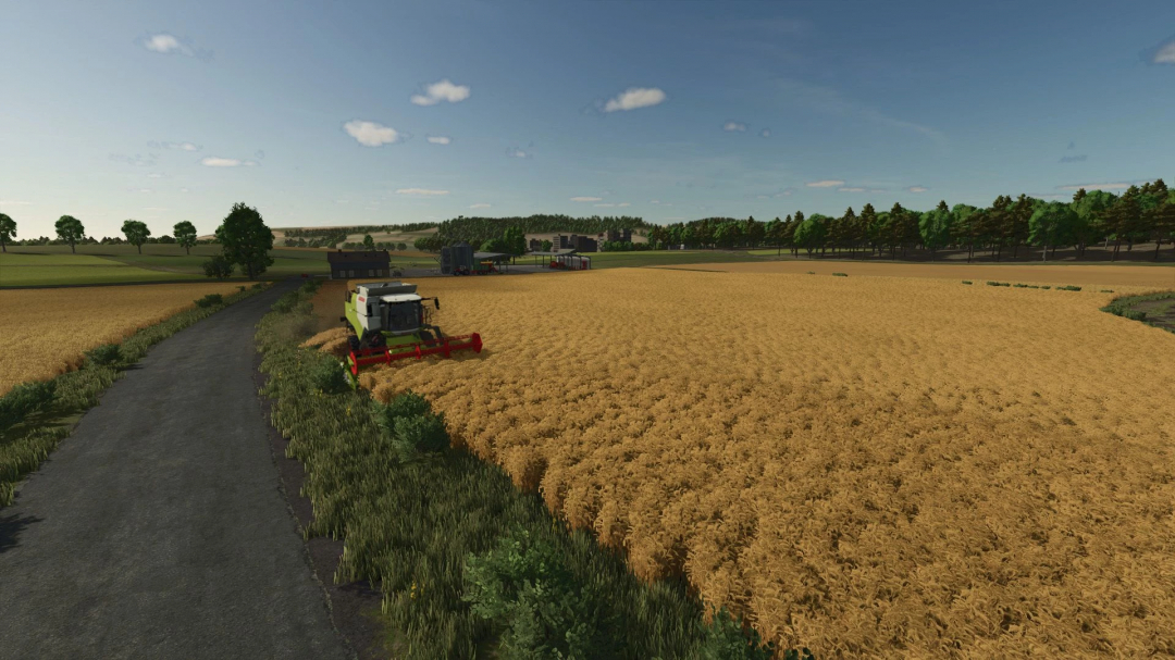 Farming Simulator 25 mod showing a combine harvester working in a wheat field on Les Terres Campagnardes map, version 1.0.0.0.
