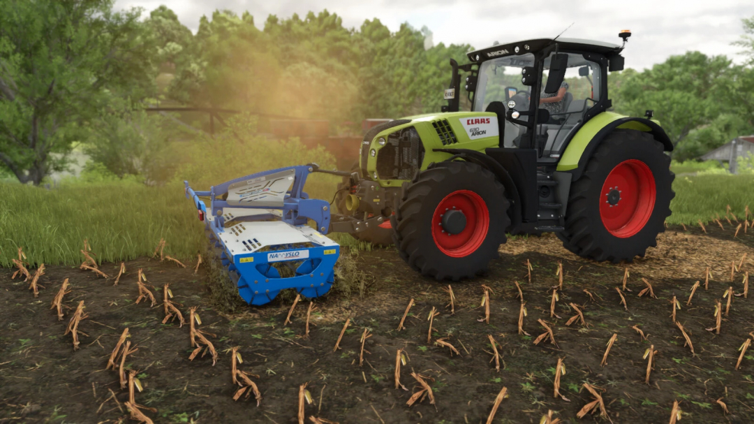 Farming Simulator 25 mod: Claas Arion tractor with Namyslo Front Cutter v1.0.0.0 working on a farm field, preparing the soil.
