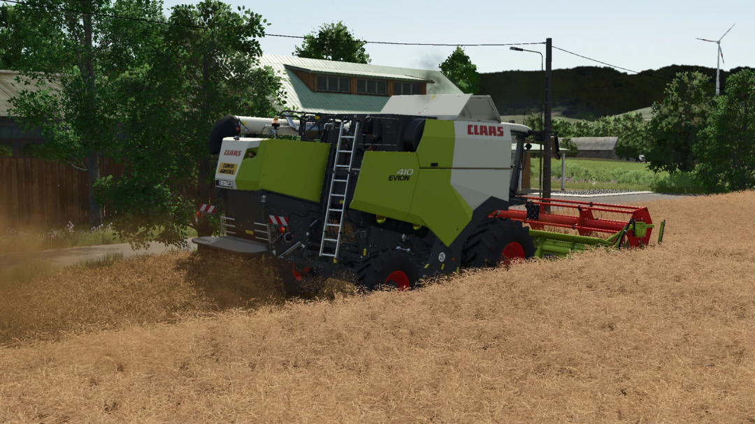 Farming Simulator 25 mods: Claas Evion 410-450 Series harvests a field of wheat with realistic farm scenery.