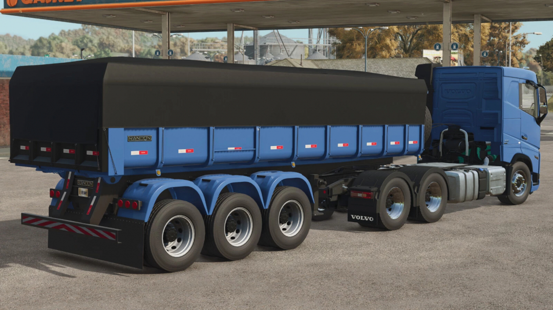 Farming Simulator 25 mod featuring the Randon Basculante 2000 in blue with a black cover, designed for transporting bulk materials.