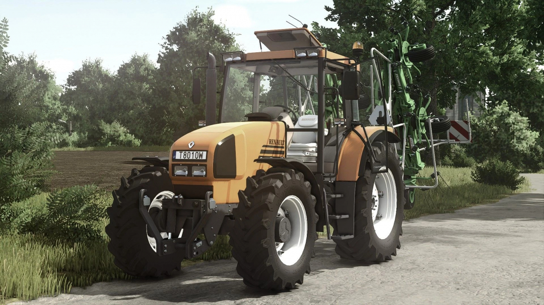 Farming Simulator 25 mod: Renault Ares 600 tractor with agricultural attachments on a farm road.