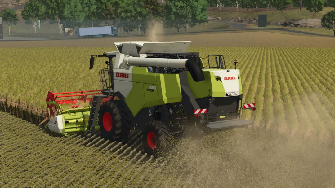 Farming Simulator 25 mod: CLAAS Evion 450 combine harvester working in a rice field.