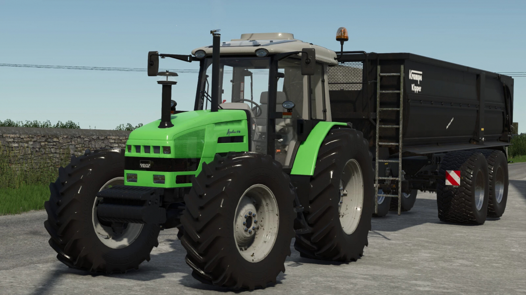 Farming Simulator 25 mod: green tractor attached to a black Krampe Kipper trailer, part of the SDF Open Field Pack v1.0.0.0.