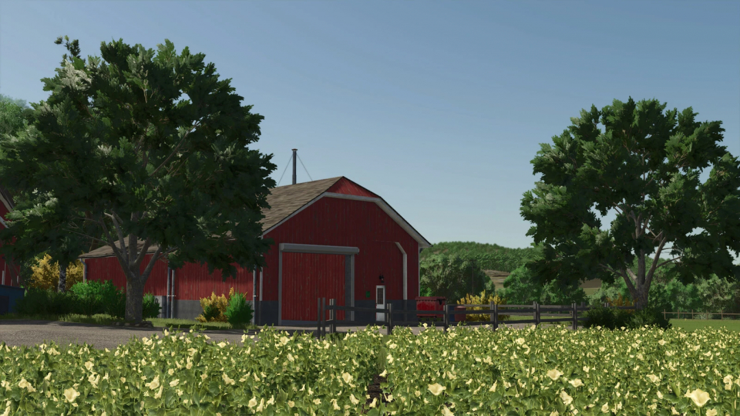 Farming Simulator 25 mod showcasing a red barn with trees and crops, featuring the US Refrigerated Hangar v1.0.0.0 mod.