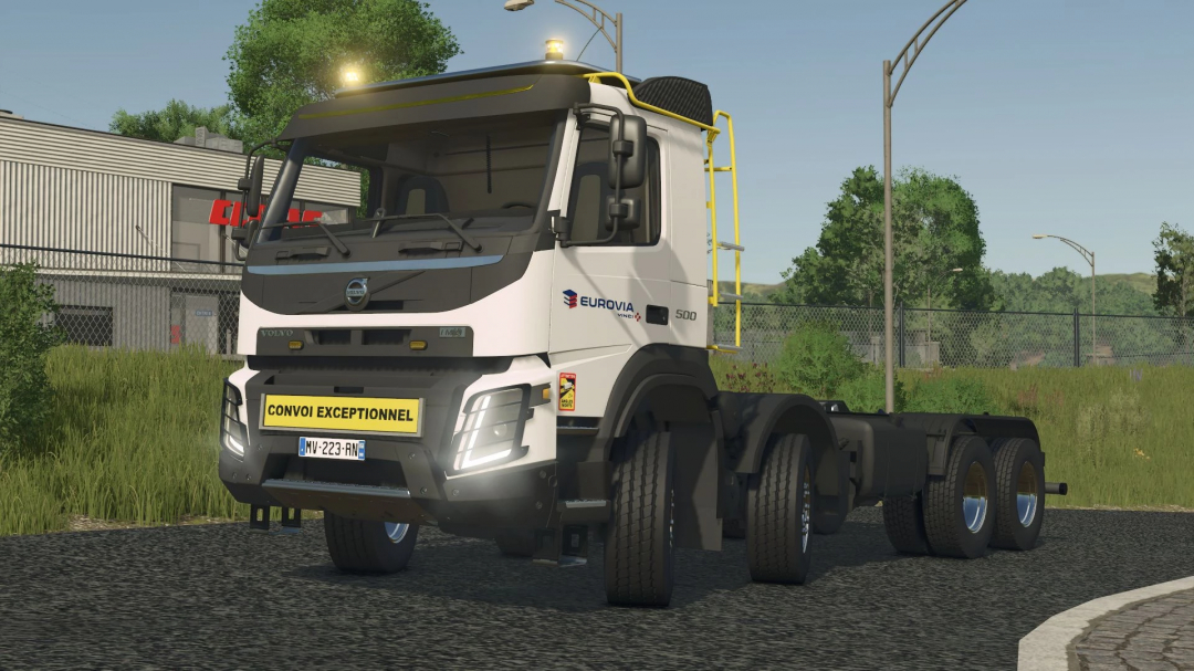 Farming Simulator 25 mod: Volvo FMX Ampiroll 8x4, truck with a yellow warning sign 'CONVOI EXCEPTIONNEL', in-game scenery with trees and fence.