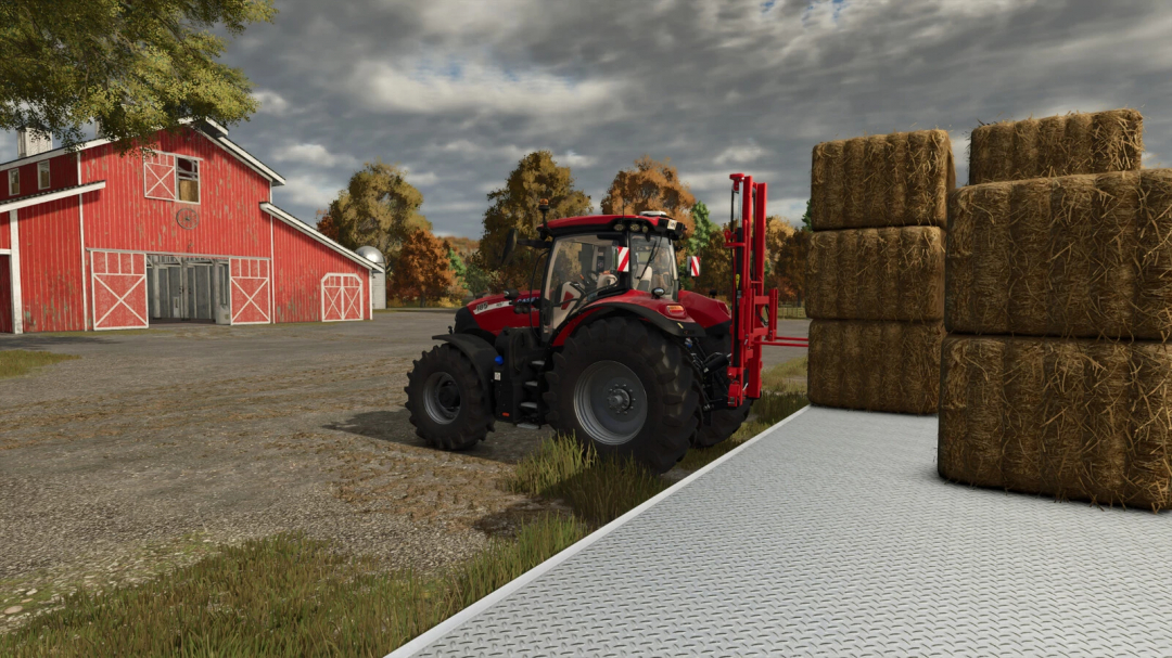 Farming Simulator 25 mod featuring a red tractor next to a stack of hay bales and a red barn in a rural farm setting.