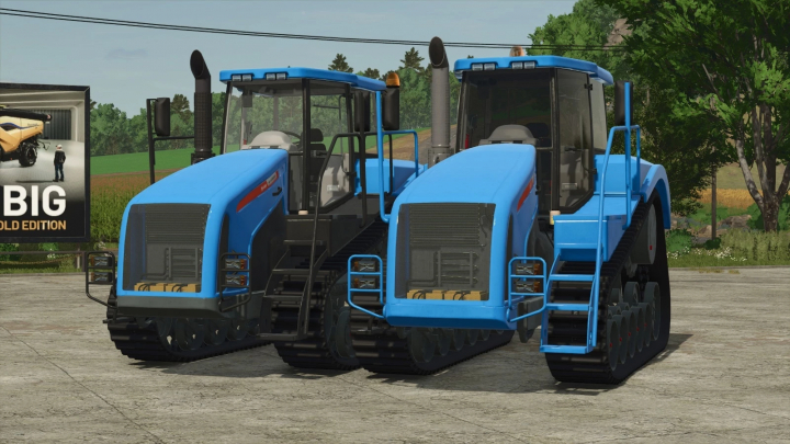 fs25-mods, Pair of blue tracked tractors with enclosed cabs in Farming Simulator 25, showcasing the Agromash-Ruslan mod.