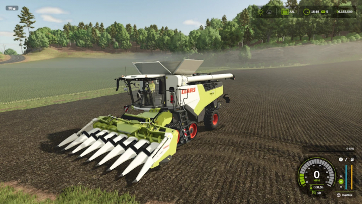 fs25-mods,  CLAAS TRION 720-750 Speedy v1.1.0.0 mod in Farming Simulator 25, harvesting crops in a field with lush trees in the background.