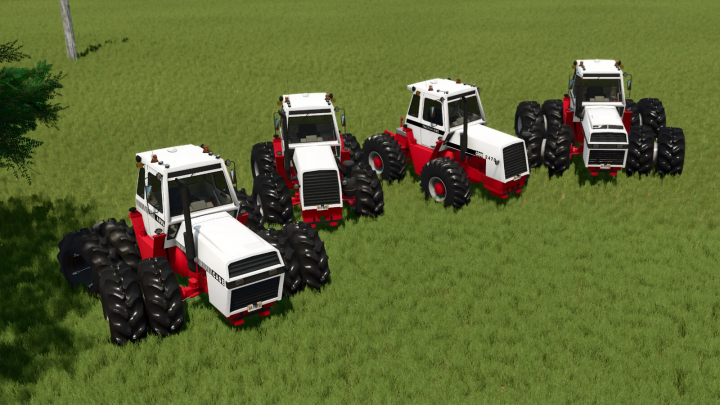 fs25-mods, Four Case IH Traction King Series tractors with large tires in Farming Simulator 25 mods, shown on grassy field.