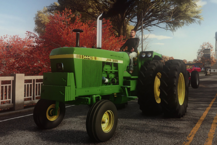 fs25-mods,  John Deere 40 series tractor mod in Farming Simulator 25, with a person sitting on it, autumn trees in the background.
