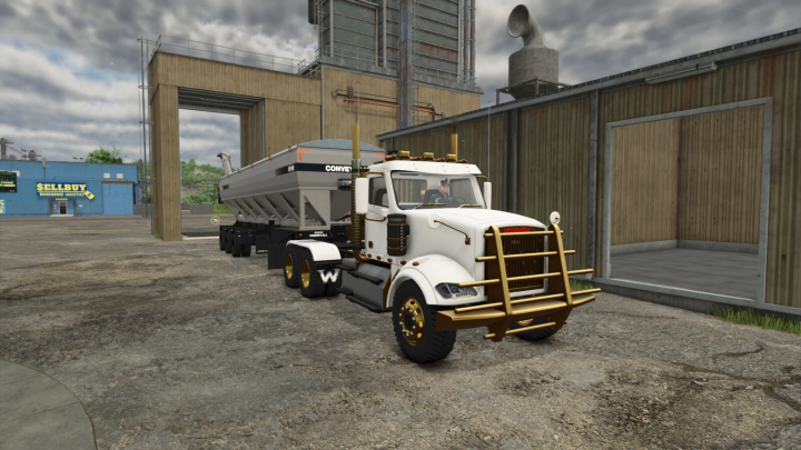 fs25-mods,  Farming Simulator 25 mod featuring the Lizard Warrior Plus v1.0.0.0 truck with a large trailer for transporting goods, parked near industrial buildings.