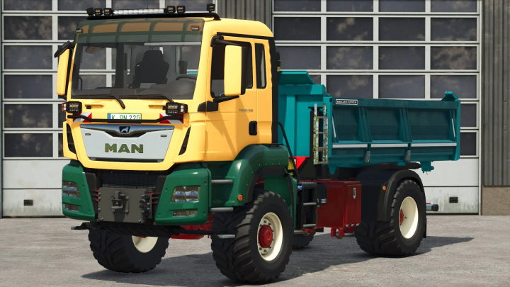 fs25-mods,  Farming Simulator 25 mod: MAN TGS 18 Series truck with a teal cargo bed, parked in front of a large garage door.