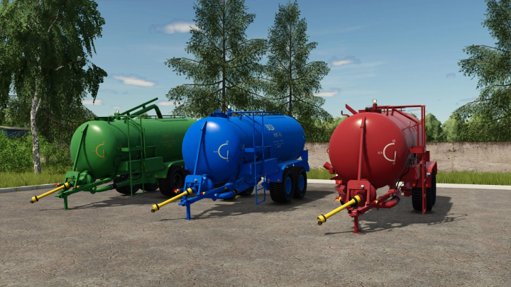 fs25-mods,  Three colored farm water tanks (green, blue, red) for Farming Simulator 25 mods, displayed outdoors on a gravel surface with trees.
