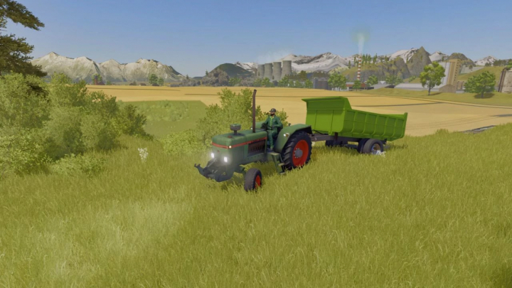 fs25-mods, Farming Simulator 25 mod showcasing a vintage green tractor with a trailer on a grassy field.