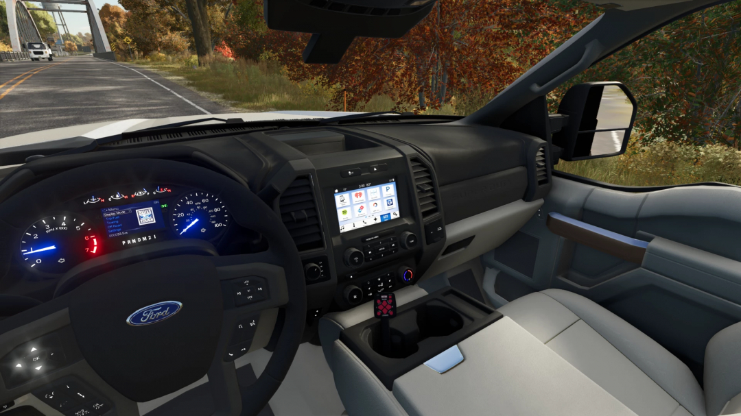 Farming Simulator 25 mod: Ford F550 truck interior with digital dashboard and touchscreen infotainment system.