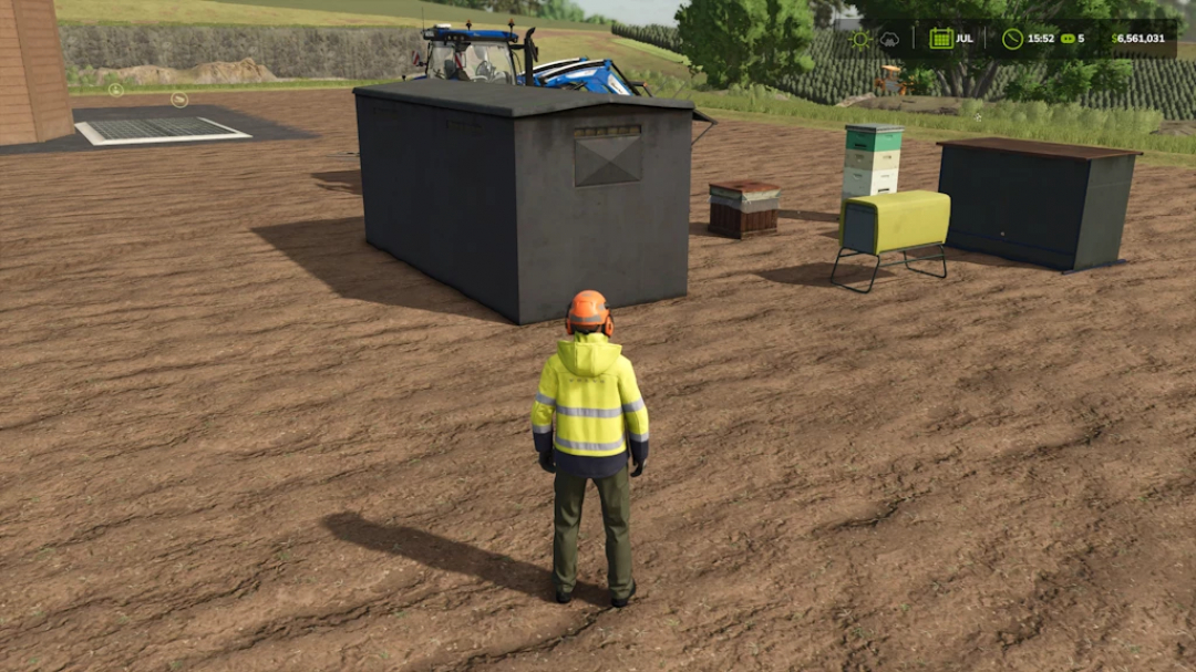 Farming Simulator 25 mod image showing a worker on the field with bee hives, storage boxes, and farming equipment, part of the Bee Hive Pack 1.2.0.0.