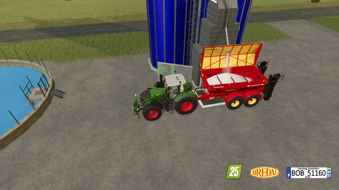 Farming Simulator 25 mod: Bredal K165 fertilizer spreader attached to a green tractor near a silo and swimming pool.