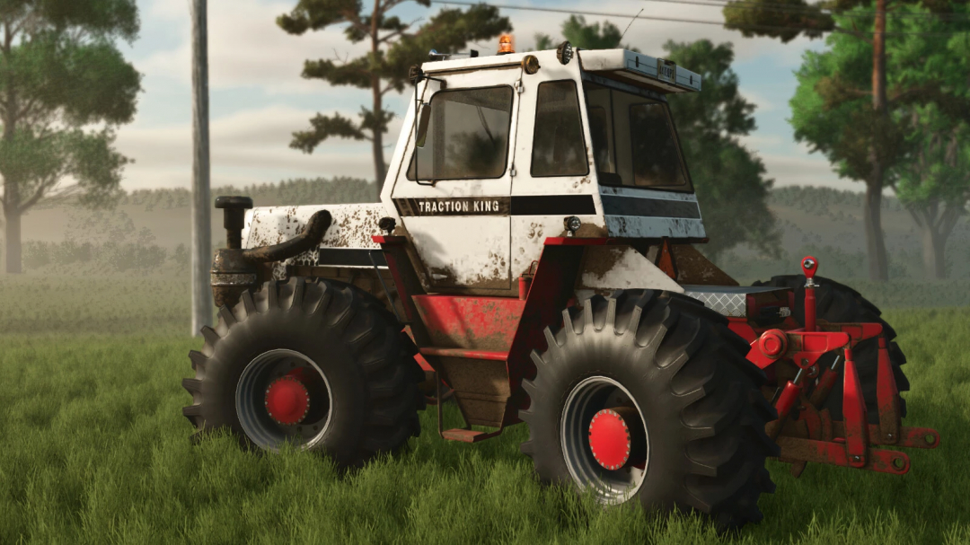 Farming Simulator 25 mod: Case IH Traction King Series tractor with worn paint and large tires, on a grassy field with trees in the background.