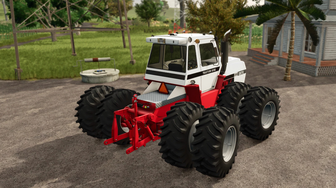 Farming Simulator 25 mod featuring the Case IH Traction King Series tractor with large tires and detailed cab in a farm setting.