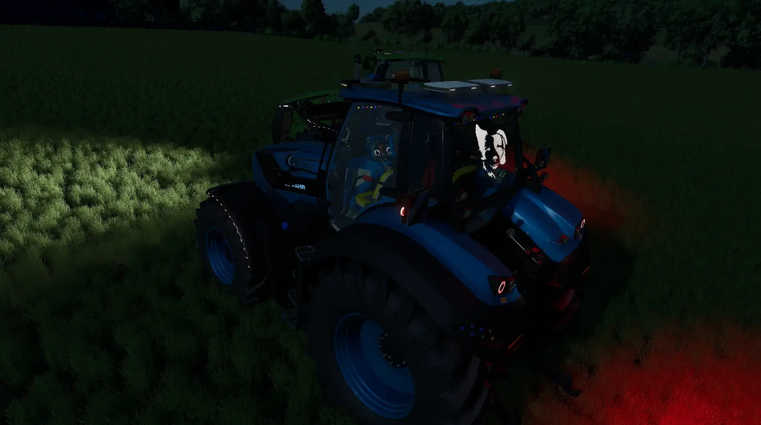 Farming Simulator 25 mod featuring a blue Deutz Fahr Serie 7 tractor at night with illuminated headlights and a lion decal on the side.
