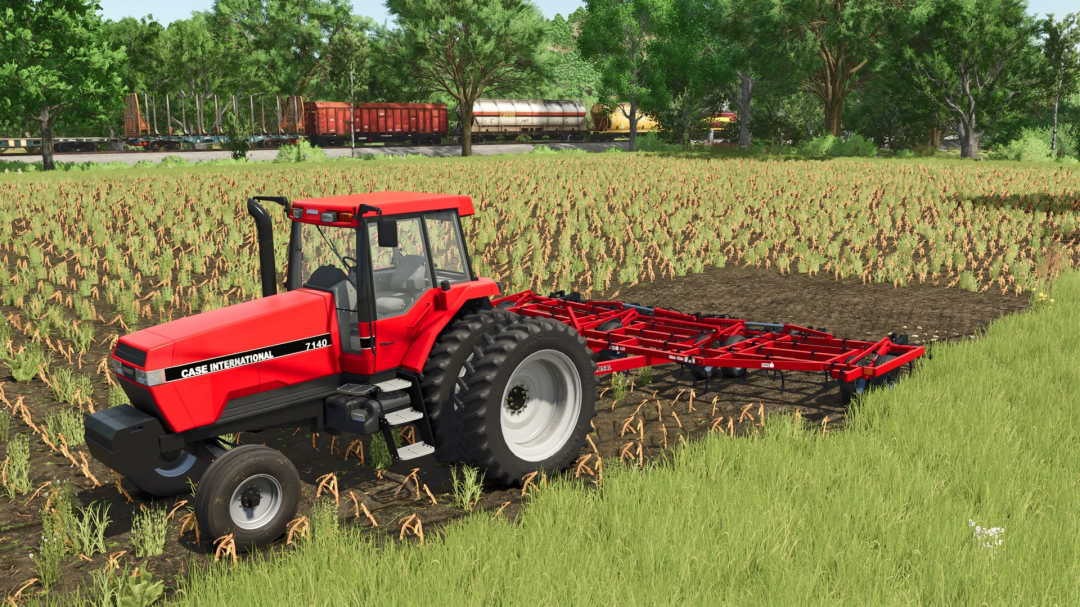 Farming Simulator 25 mod: Red CaseIH 4600 Vibra Shank tractor working in a field, with farm equipment in the background.