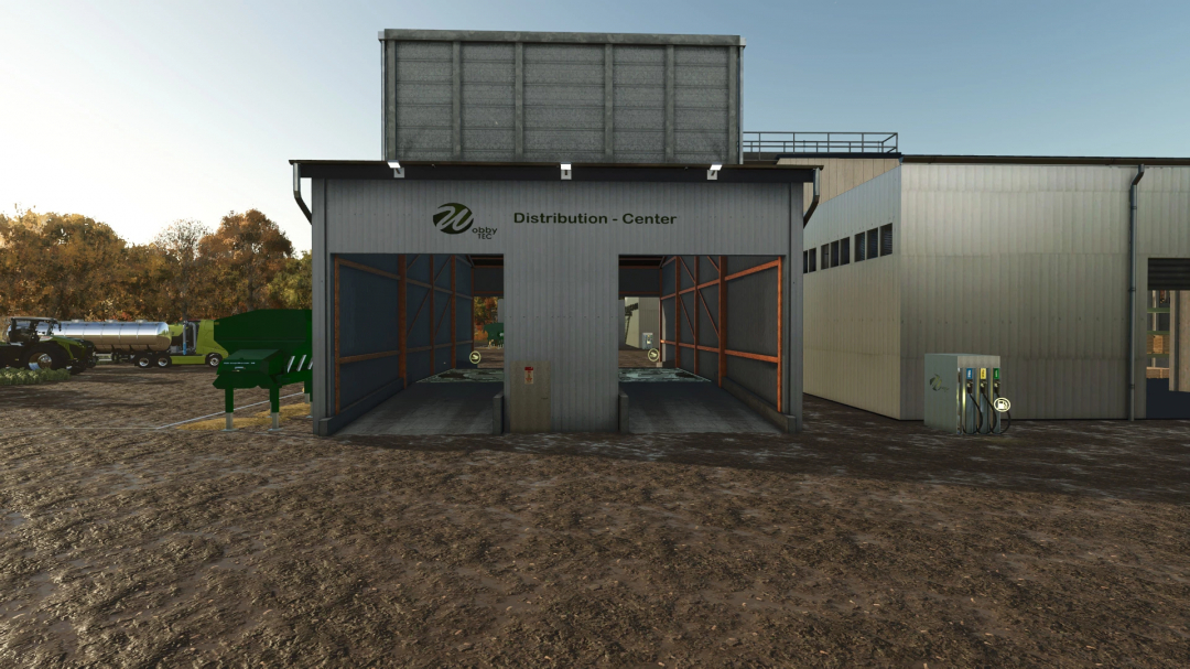 Farming Simulator 25 mod: FS25 DriveIn WobbyTec v1.0.0.0 at the distribution center, with fuel pumps and loading bays.