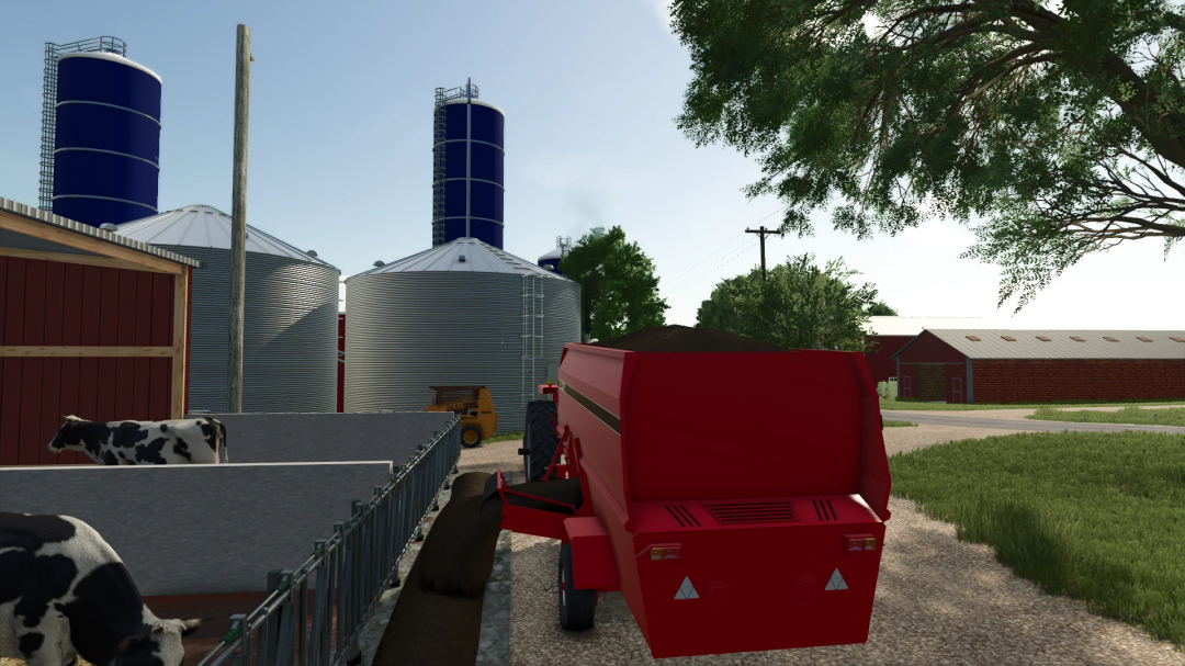 Farming Simulator 25 mods: red Gehl Mixing Wagon FS25 v1.0.0.0 on a farm with silos, cattle, and farm buildings.