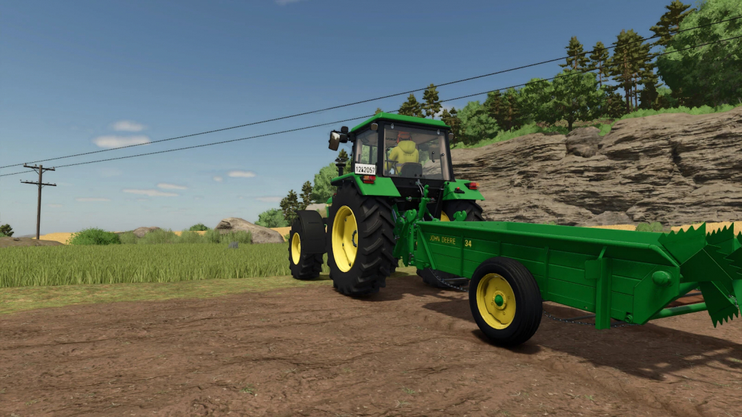 Farming Simulator 25 mod: John Deere 34 tractor with seeder attachment on a farm field under blue sky.