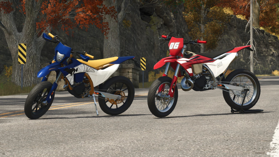Two off-road motorcycles on a rural road, one in blue and yellow and the other in red and white, with trees and rocks in the background, from Farming Simulator 25 mods.