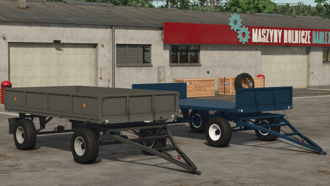 Farming Simulator 25 mods: Lizard D-46 v1.0.0.0 trailers parked outside a workshop, ready for farming tasks.