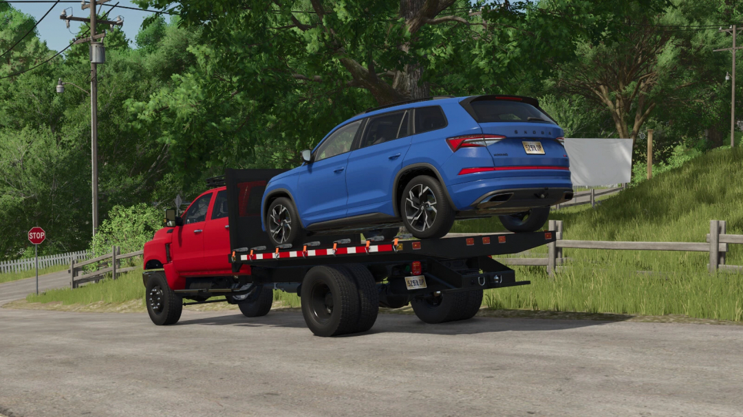 Farming Simulator 25 mod: Red truck transporting a blue SUV on a flatbed trailer, with trees and a stop sign in the background.