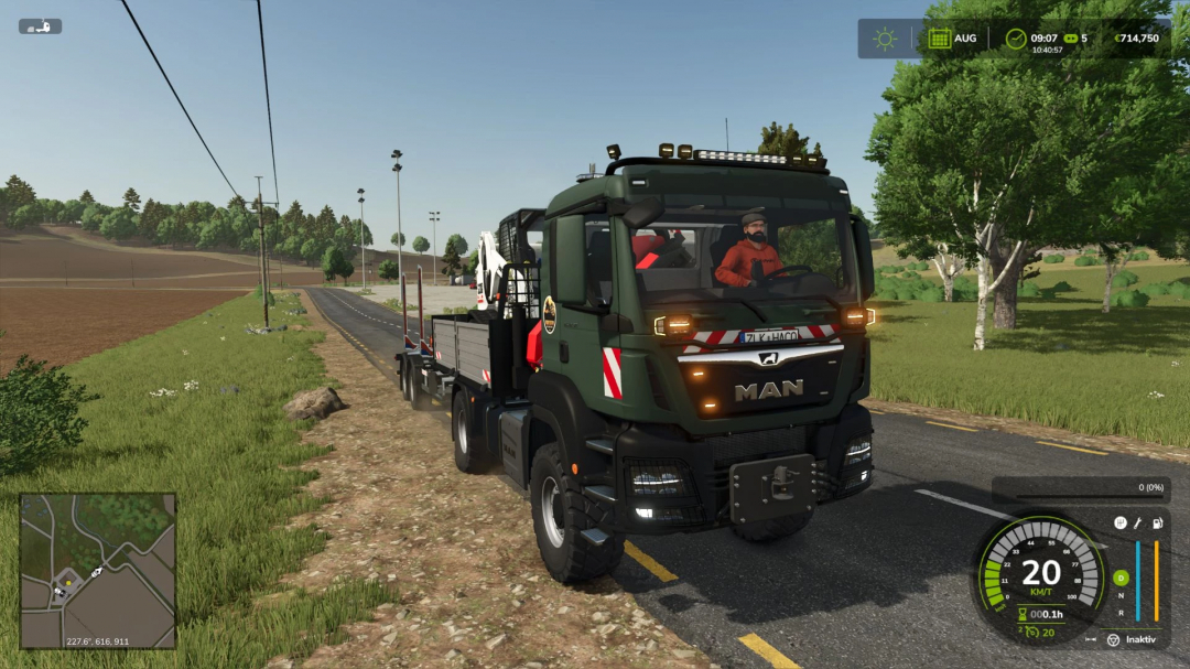 FS25 mod: MAN TGS 18 with 4x4 and crane, off-road heavy-duty truck in Farming Simulator 25, on a rural road with trees and fields.
