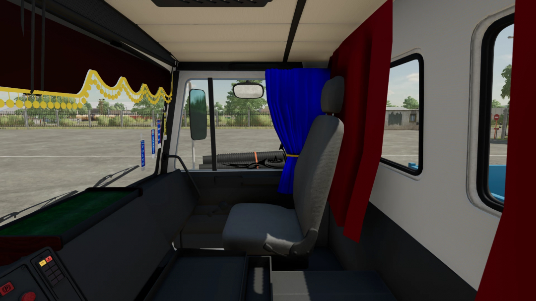In-game interior of a truck from Farming Simulator 22 featuring blue curtains and a gray driver's seat, part of the FS22 mods pack.