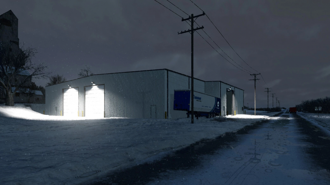 Night view of a modern industrial building in snowy weather, illuminated garage doors, suitable for Farming Simulator 25 mods.