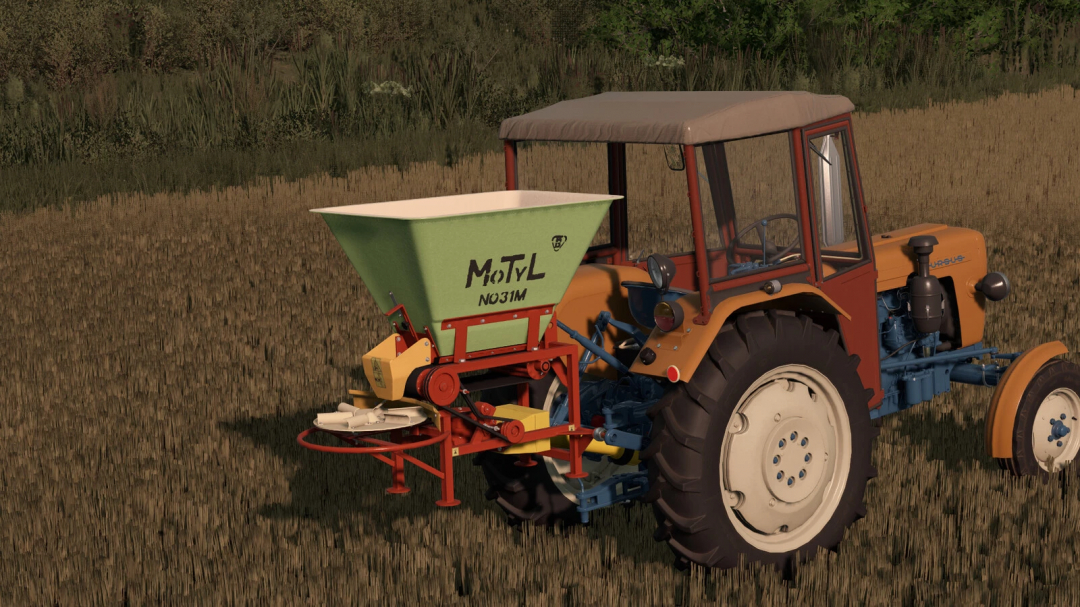 Farming Simulator 25 mods, tractor with Motyl N031M seed spreader attached in a field.