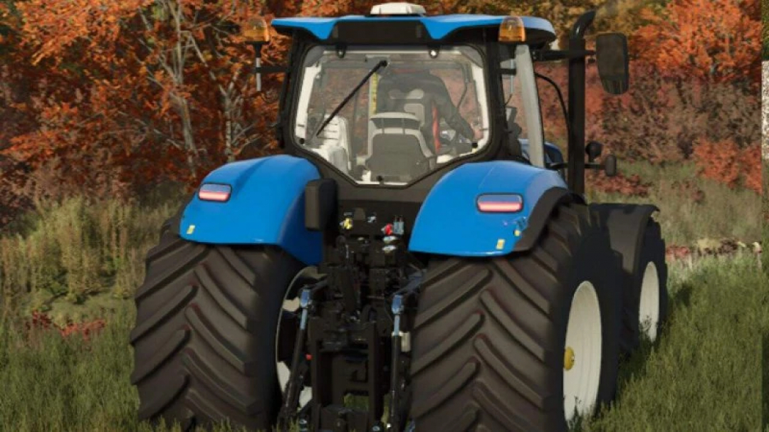 Farming Simulator 25 mod: New Holland T7 Series tractor with vibrant blue color and large tires, set in a field during autumn.
