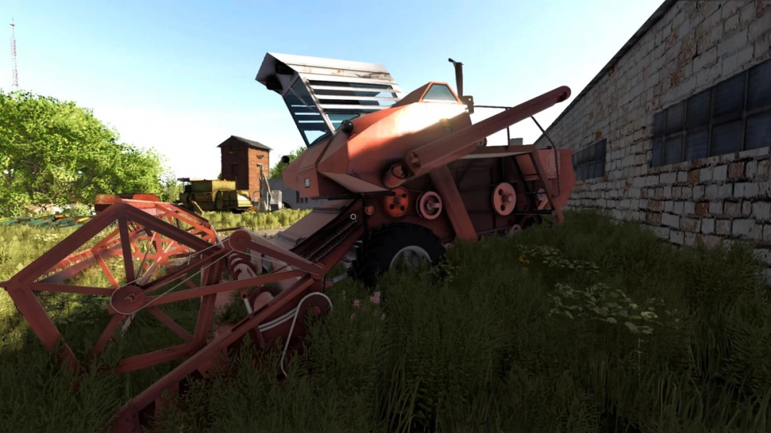 Farming Simulator 25 mods: Niva SK-6 Kolos v1.0.0.0 tractor abandoned next to a brick wall with overgrown grass.