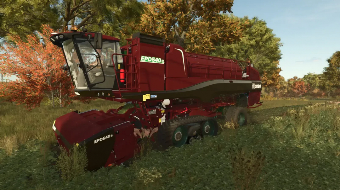Farming Simulator 25 mods, Oxbo Pack v1.1.0.0, red agricultural harvesting machine in a grassy field with autumn trees in the background.